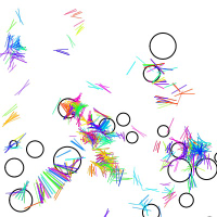 Black circles on a white background, next to rainbow colored short lines, distributed like straws across the image. 